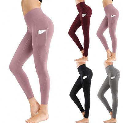 China Dropshipping Breathable High Waist Yoga Pants With Pockets Tummy Control Leggings Workout 4 Way Stretch Seamless Yoga Gaiters for sale