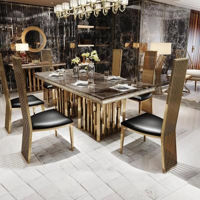 China Bling Gold Visionary Interior Design Luxury Bling Stainless Steel Marble Shiny Dining Table for sale