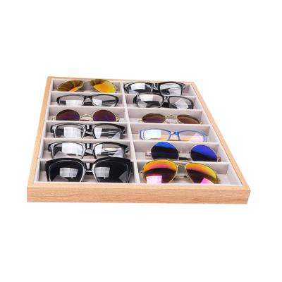 China Recycled Materials Customized 12 Slot Wood Eyewear Display Tray for sale