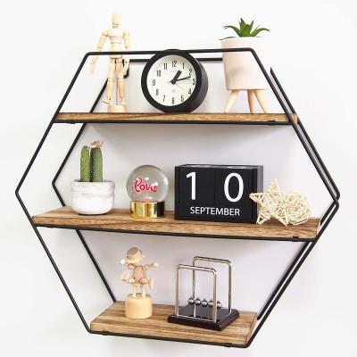 China 2021 Modern Wall Mounted Hexagon Metal Wall Hanging Shelf Floating Shelves Shelves For Wall Decor for sale