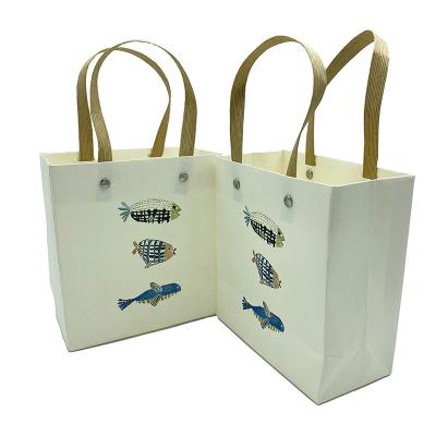 China Custom Luxury Recycled Material Design Logo Offset Printing Household Products Shopping Mall Carrier Paper Gift Bags With Handles for sale