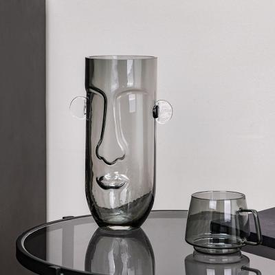 China Minimalist Glass Human Face Vase Decoration Design For Home Decor Clear Vase for sale