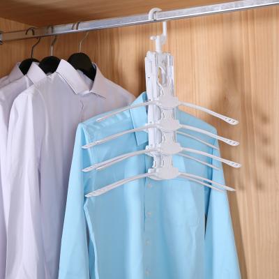 China Eco-friendly Foldable Portable Plastic Cloth Hanger Cloth Hanger Rack for sale