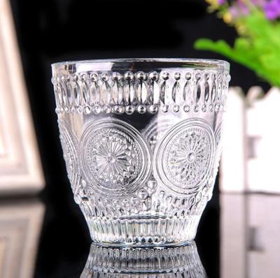 China Sunflower Drinking Glass 137ml Viable Embossed Glass Cup Glass Tea Cup for sale