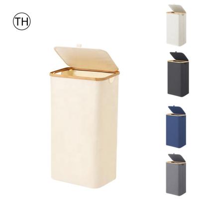 China Carry Dirty Clothes Supply Reasonable Price Large Capacity Laundry Shelf With Basket Straw Household Items Tall Bathroom Cabinet With Laundry Basket for sale