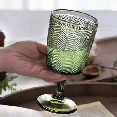 China New French style wine goblet wedding decoration cup classic/postmodern colored glass glass European embossed green leaf colored wine goblets for sale