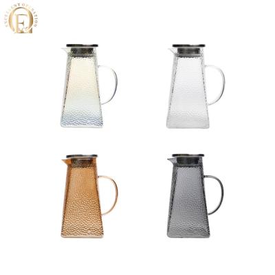 China Sustainable High Quality Hammered Glass Kettle With Stainless Steel Stopper for sale