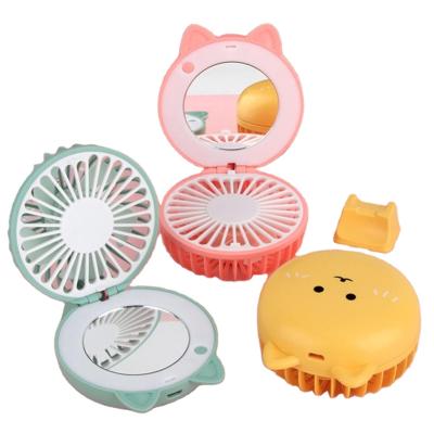 China Cat Portable Mini Pocket Fan LED Sufficiency Cute Luminous Rechargeable Light with Makeup Mirror Portable Fan Design Cat LED Light for sale