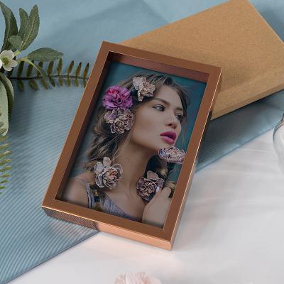 China Dongjin Amazon new style wall decor PVC gold color popular plastic picture frame factory price hot sale home decorative art table display frame for sale