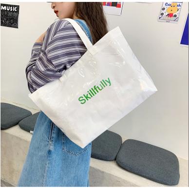 Chine High Quality China Fashion Ladies PVC Handbag Wholesale Letter Printed Shoulder Sling Bags Ladies Large Tote Bag For Women à vendre