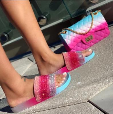 China Fashion Trend 2021 Summer Ladies Fashion Designers Sandals PVC Slide Beach Luxurious Rhinestone Flat Slipper Women for sale