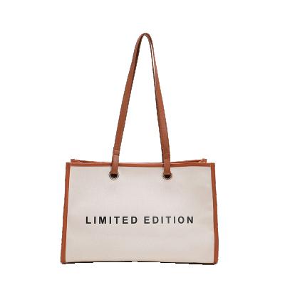 China Other 2022 Fashion Trend Large Capacity Material Zipper Canvas Letter Tote Bag Sling Shoulder Pack Women's Casual Handbags zu verkaufen