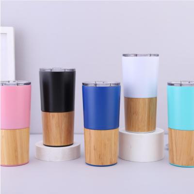 China Sustainable Double Wall Stainless Steel Coffee Mug Vacuum Insulated Tumbler 20oz With Wood Surface for sale