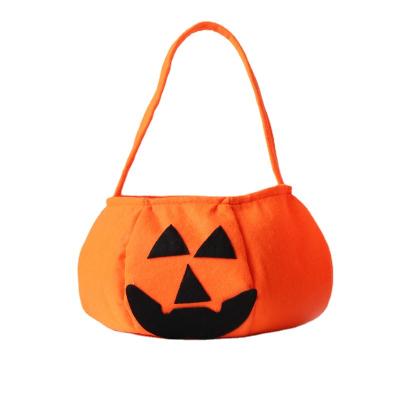 China Portable Halloween Pumpkin Candy Bag Halloween Nonwoven Bags For Candy for sale