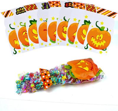 China Plastic Halloween Trick or Treat Party Favor Bag Party Favor Pumpkin Face Shape Halloween Gift Bag for sale