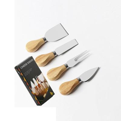 China 4 Pieces Stainless Steel Wood Stocked Acacia Handle Cheese Knife Set Butter Knife Pizza Knife for sale