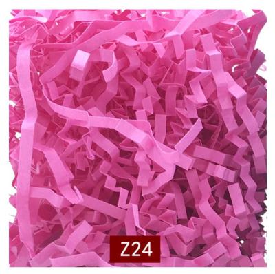 China Recycled Materials Recycle Wave Shredded Paper Filler Crease Cut Paper Shred Filler Pink Shredded Paper for sale