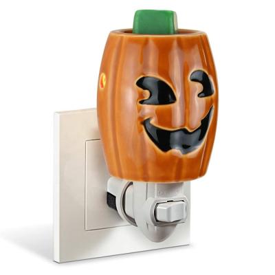 China Chinese Electric Wax Burner Decoration Halloween Incense Evil Pumpkin Plug In Wax Warmer For Scented Wax Melting for sale