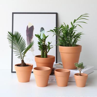 China Modern flower pots and planters aerial flower vase ceramic dry matte painted pot ceramic flower pot for sale for sale