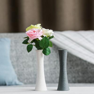 China Simple Minimalist Matt White Round Cylindrical Small Ceramic Flower Vase for sale