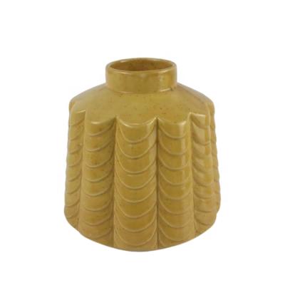 China New classic/postmodern high quality handmade yellow ceramic vase with round bottom and textures for sale