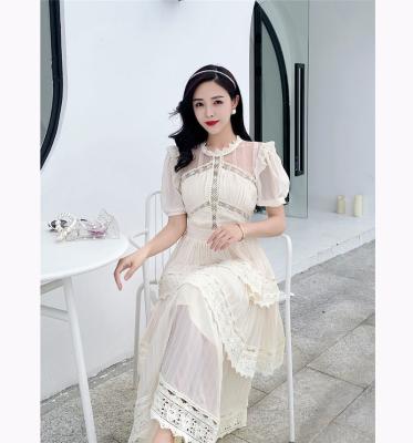 China New summer 2022 anti-static beige lace stitching fairy cake sleeve pleated dress princess evening elegant French short long maxi dress for sale