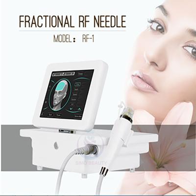 China Anti-Puffiness Stretch Marks Removal Scarlet Gold Fractional Micro RF Needle Machine for sale