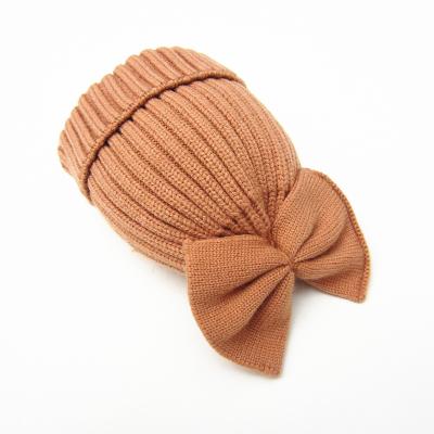 China COMMON Top Flower Bowknot Kids Boy Knitted Knotted Kids Hat Baby Beanie for sale