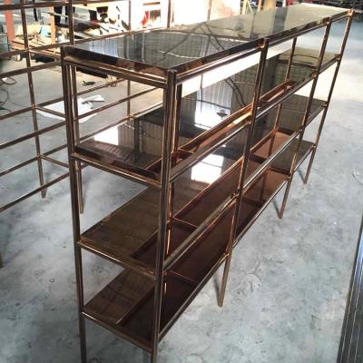 China Modern Customized Stainless Steel Multilayer Store Shelves Display Rack For Store With Rose Gold Mirror for sale