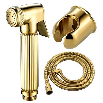 China Sefl-Cleaning Premium Brass Bathroom Diaper Bidet Faucet Sprayer Shiny Gold Handheld Toilet Set for sale