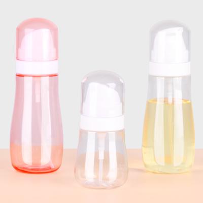 China Bulk BEAUTY PACKAGING Mini Empty Spray Bottle Pump Bottles 50ml Silicone Hand Sanitizer Holder Plastic Bottles for sale