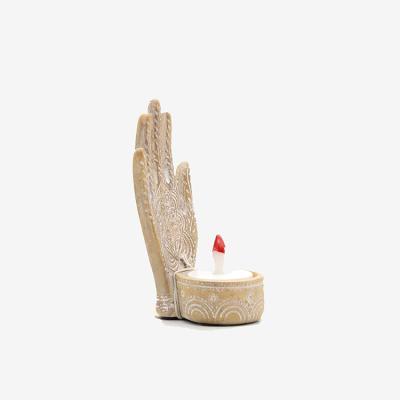 China Home Decoration Centerpiece Small Buddha Hand Decoration Luxury Resin Candle Holder for sale