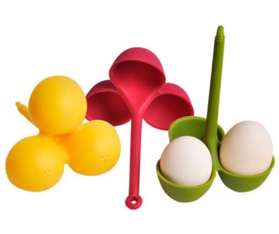 China Eco-friendly Silicone 3 Egg Boiler Poacher Holder With Handle for sale