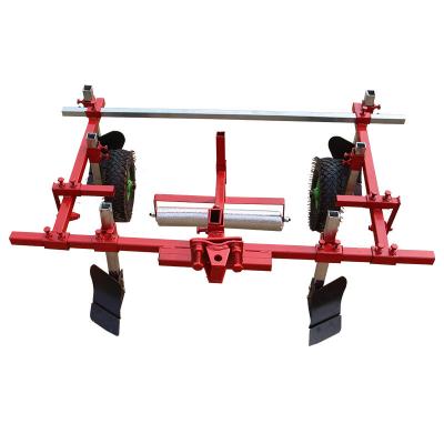 China Cereal Grain Equipment 2hp Mini Tiller Plastic Mulch Layer Agricultural Machine for sale