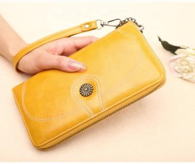 China Hot-selling Anti-theft PU Leather Wallet For Women Long Waist Ladies Pinch Wallet Phone Wallet With Zipper for sale