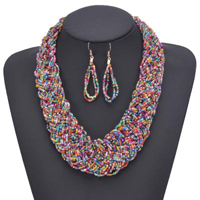 China Charm Factory Price Bohemian Handmade Seed Bead Ladies Clavicle Chain Jewelry Set American Necklace Earrings Set For Women Ceremony for sale