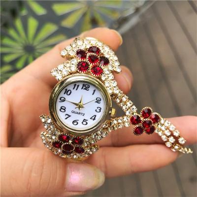 China High Quality Chronograph Amazon Bride Jewelry Bracelet Women Watch Multi Colors Diamond Flower Chain Pendant Lady's Quartz Wrist Watch Reloj for sale