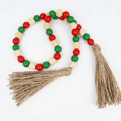 China 100% Handmade Wooden Wooden Bead Garland Christmas Ornaments Tassel Home Decoration Wall Hanging Decors for sale