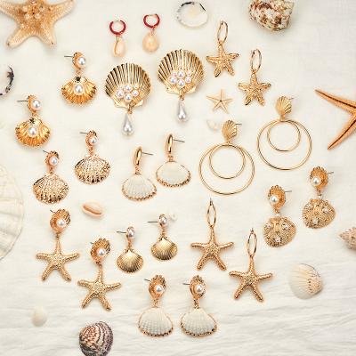 China Punk natural cowrie sea shell huggie drop earrings strands boho women earrings conch shell earrings for sale