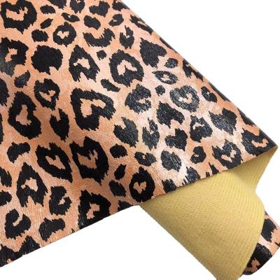 China Elastic (FA-519) Sparkling Foil Faux Gloss Transfer Leopard Shape Heart Polyester Leather Fabric For Bags Shoes Belt DIY Crafts for sale