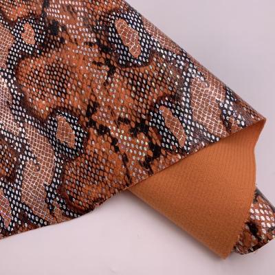 China Elastic (FA-377) Snakeskin Pattern Synthetic Fabric Leather with Laser Spots for Shoes Bags and Bows DIY Materials for sale