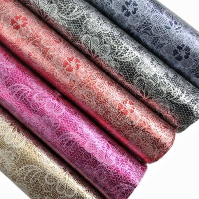 China 0.65mm Waterproof Faux (FA-799) Foil Transfer Plum Flower Polyester Soft Synthetic Fabric Leather for Bags Shoes Decorate Materials for sale