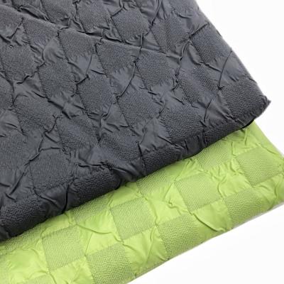 China (2218) 0.25 Super Thin Green QUICK DRY Popcorn Chessboard Polyester Fabric For Garment Fabric Suit Bags Shoes for sale