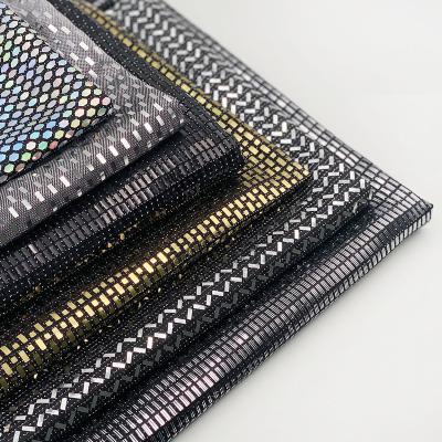 China Custom multicolor sequin metallic shimmer knit single tank top stick adorn poly lurex spandex sequin fabric for sale