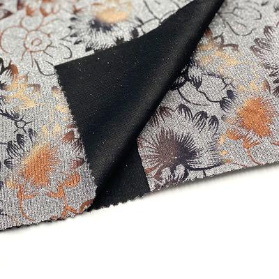 China Shrink-resistant composite fabric contains two layers of colorful glod glitter polyester pongee graduated color foil flower print fabric for sale