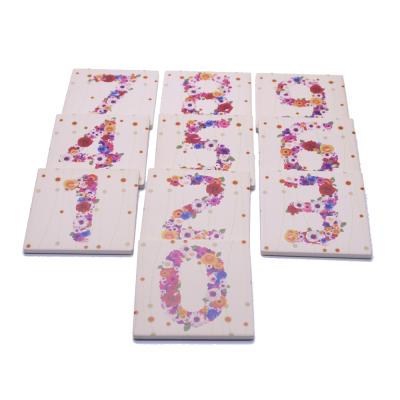 China Viable Flower Number Printed Ceramic Stone Water Absorbing Coaster Cup Mat Souvenir Gifts for sale