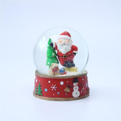 China Europe Craft Resin Christmas Santa Snowball Water Globe Gifts for sale