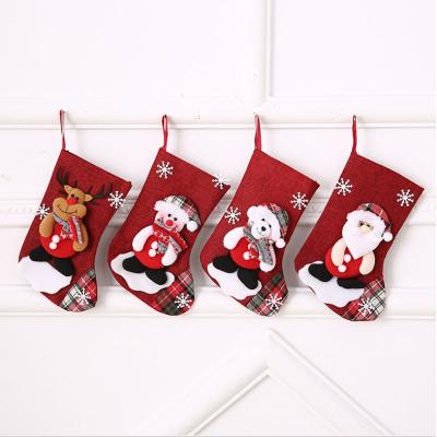 China Beautiful Colorful New Year Christmas Jars Santa Claus Snowman Deer Bear Style Christmas Gift Bag Christmas Stockings for sale