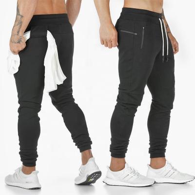 China QUICK DRY Mens Sports Running Pants Pockets Jogging Pants Legging Gym Soccer Football Training Pants Sports Elasticity Pants for sale