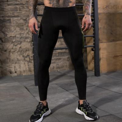 China 2022 Men Gym Sport Breathable Workout Winter Fitness Wear Tights Pants Suite Quick Dry Compression Gaiters for sale